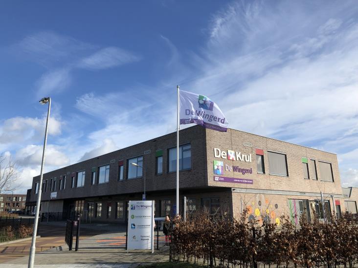 Basisschool De Wingerd in Goes met een uitzicht op het schoolgebouw en de vlag. Basisschool De Wingerd in Goes met een uitzicht op het schoolgebouw en de vlag.