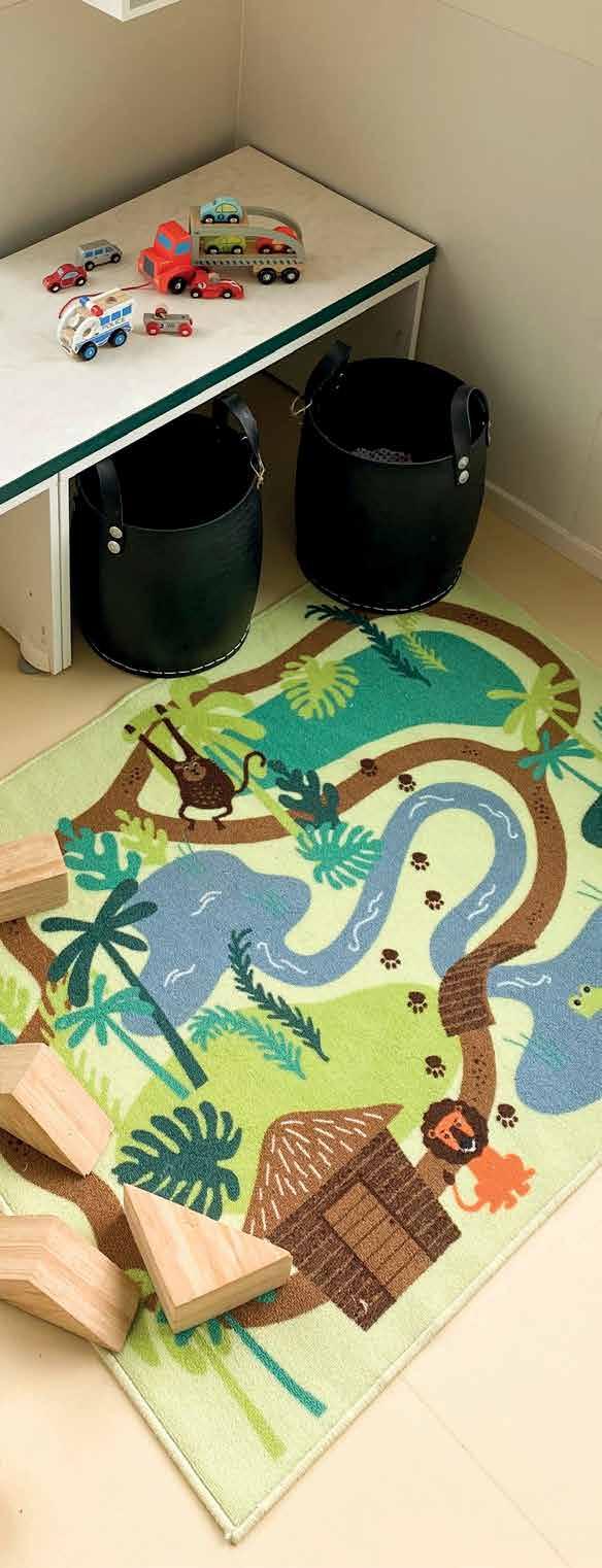 Deze afbeelding toont een speelhoek met een kleurrijk tapijt en speelgoed in Kindcentrum De Spreng in Hoevelaken. Deze afbeelding toont een speelhoek met een kleurrijk tapijt en speelgoed in Kindcentrum De Spreng in Hoevelaken.
