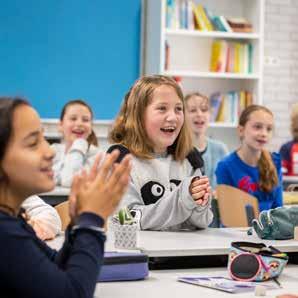 Een blije leerling in de klas van Het Baken I in Veenendaal. Een blije leerling in de klas van Het Baken I in Veenendaal.