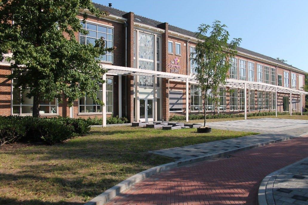 IKC Het Sterrenpalet in Eibergen, met een uitzicht op het moderne schoolgebouw en de omringende tuin. IKC Het Sterrenpalet in Eibergen, met een uitzicht op het moderne schoolgebouw en de omringende tuin.