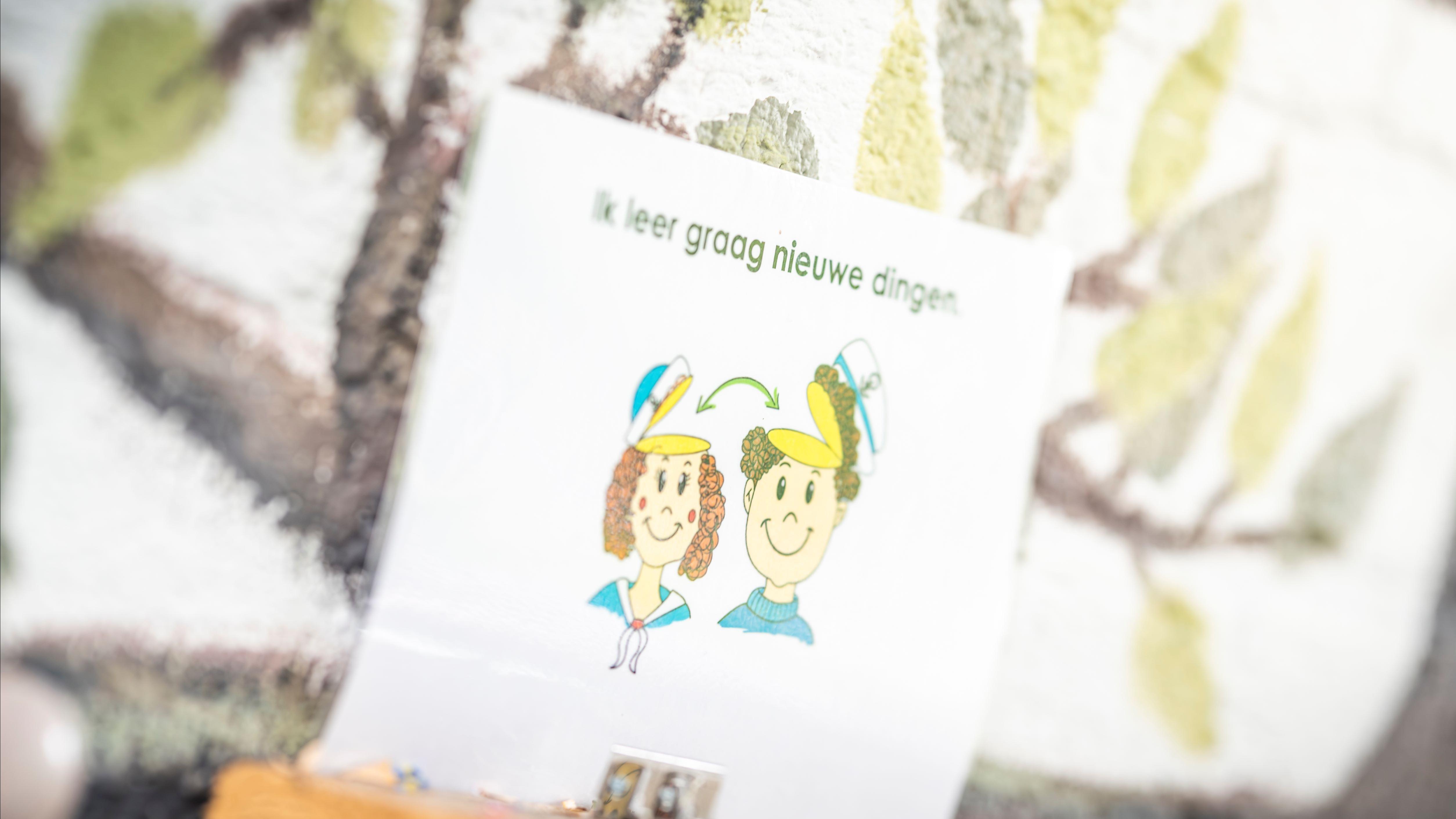 Illustratie met de tekst "Ik leer graag nieuwe dingen" op de school van 'Aan Boord' in Dronten. Illustratie met de tekst "Ik leer graag nieuwe dingen" op de school van 'Aan Boord' in Dronten.