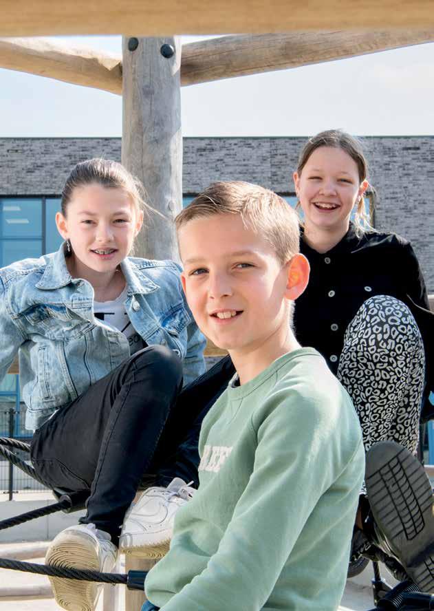 Kindcentrum De Spreng in Hoevelaken, kinderen spelen vrolijk op het schoolplein. Kindcentrum De Spreng in Hoevelaken, kinderen spelen vrolijk op het schoolplein.