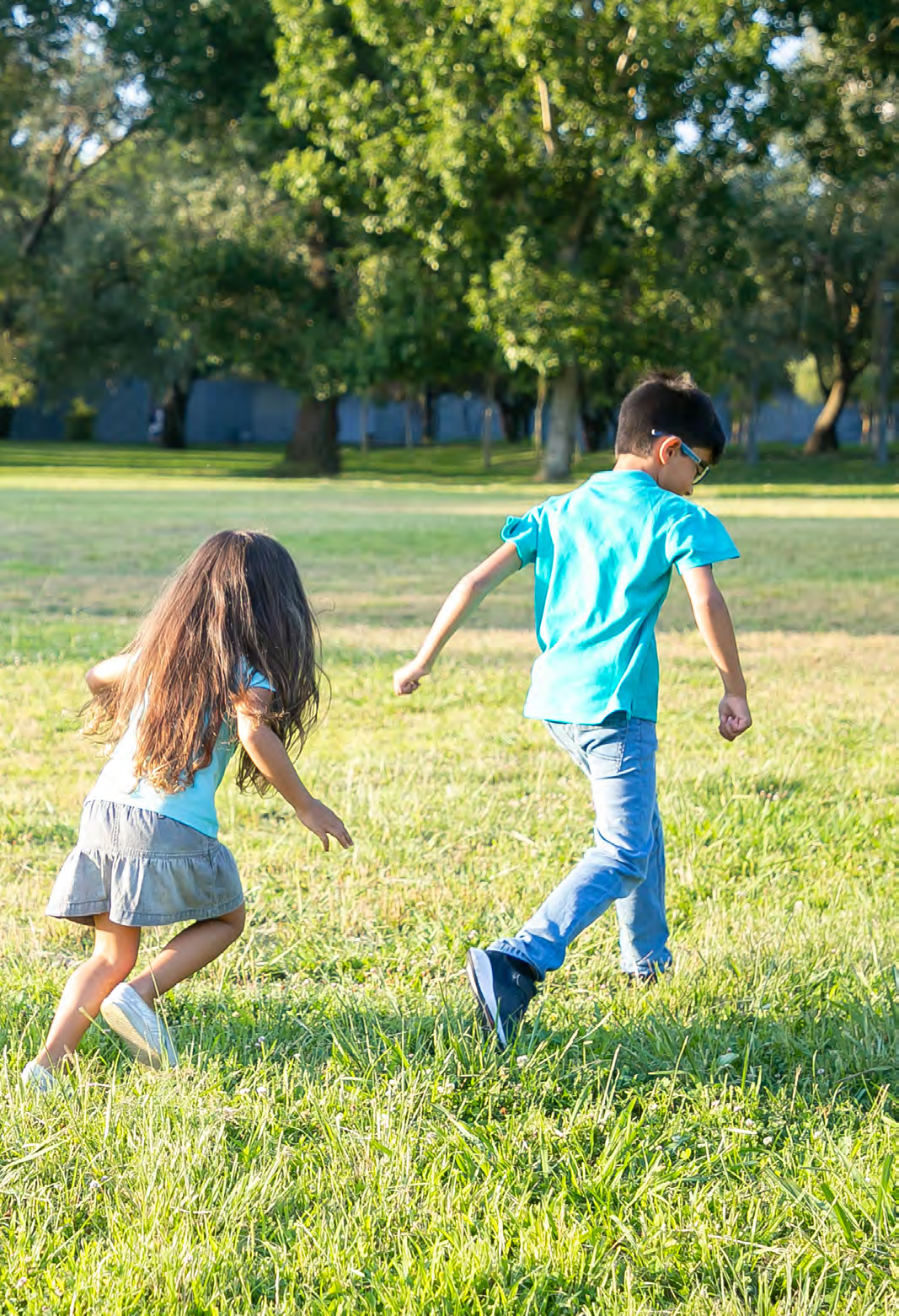 Kinderen rennen op het schoolplein van IBS De Vijgenboom in Amsterdam. Kinderen rennen op het schoolplein van IBS De Vijgenboom in Amsterdam.