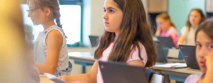 Kinderen zijn actief aan het leren in de klas van De Triangel in Enschede. Kinderen zijn actief aan het leren in de klas van De Triangel in Enschede.