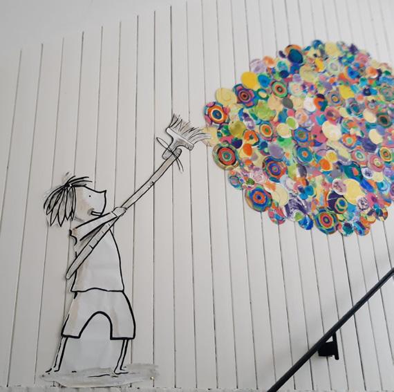 Kunstwerk aan de muur van Bs de Disselboom in Wintelre toont een kind dat kleurige cirkels schildert. Kunstwerk aan de muur van Bs de Disselboom in Wintelre toont een kind dat kleurige cirkels schildert.